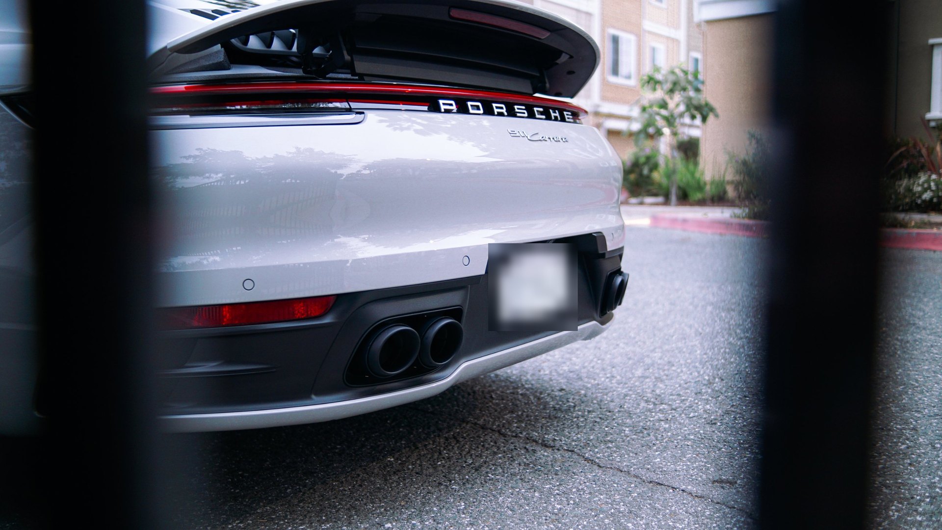 Black Exhaust Tips on a Porsche 911 Carrera (992)